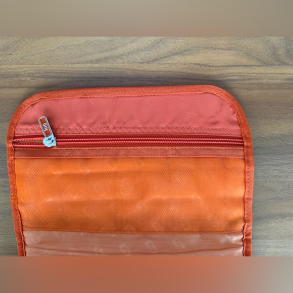 Lug Quilted Orange Crossbody Organizer Bag. Interior & exterior pockets. - Picture 9 of 10